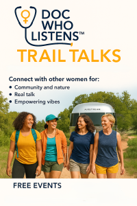 A group of diverse woman walking outdoors in front of an Airstream Trailor